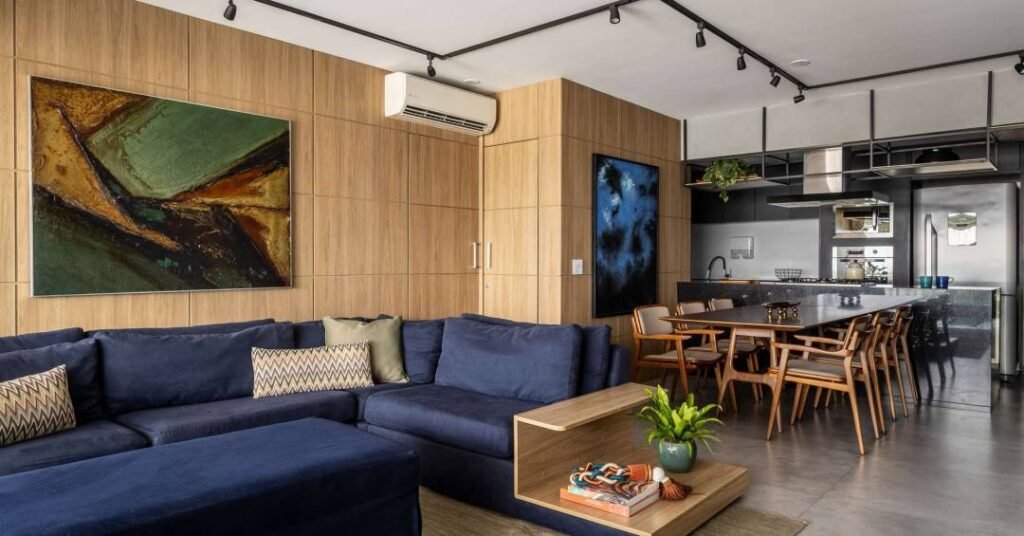 Apartamento em São Paulo tem estilo industrial na área social e varanda zen