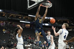 A temporada termina hoje à noite em Las Vegas. WVU joga contra Oklahoma pelo campeonato College Basketball Crown. Aqui está tudo o que você precisa saber.