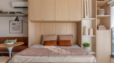 Cama retrátil otimiza cada centímetro deste estúdio de 24 m²