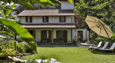 Passado e presente: casa de praia 1980 ganha renovação e ampliação em direção à serra